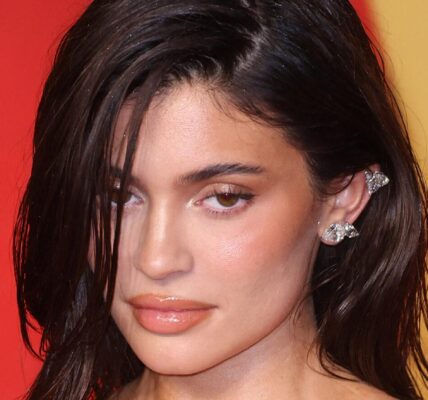 Kylie Jenner Channels Pamela Anderson With Blonde Makeover