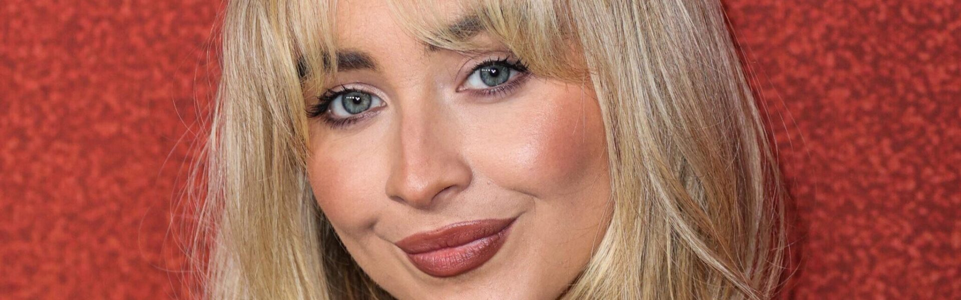 Sabrina Carpenter Sizzles In Daisy Dukes For 'Manchild' Music Video