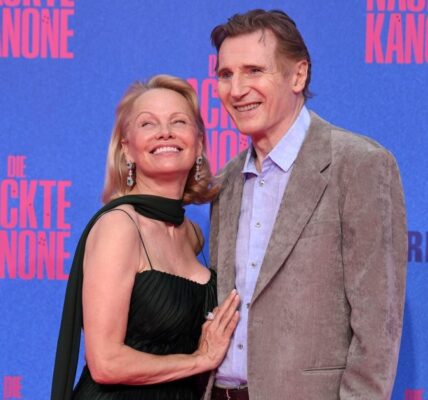 Pamela Anderson and Liam Neeson Are Dating: 'Obvious' Spark