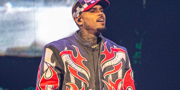 Chris Brown & Influencer Jada Wallace Fuel Dating Rumors After She Pops Out With Royalty