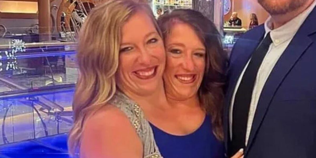 Conjoined Twins Abby and Brittany Run Errands With Dogs After Baby Outing